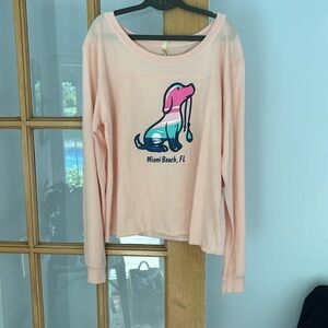 Brand new long sleeved top size medium peach color